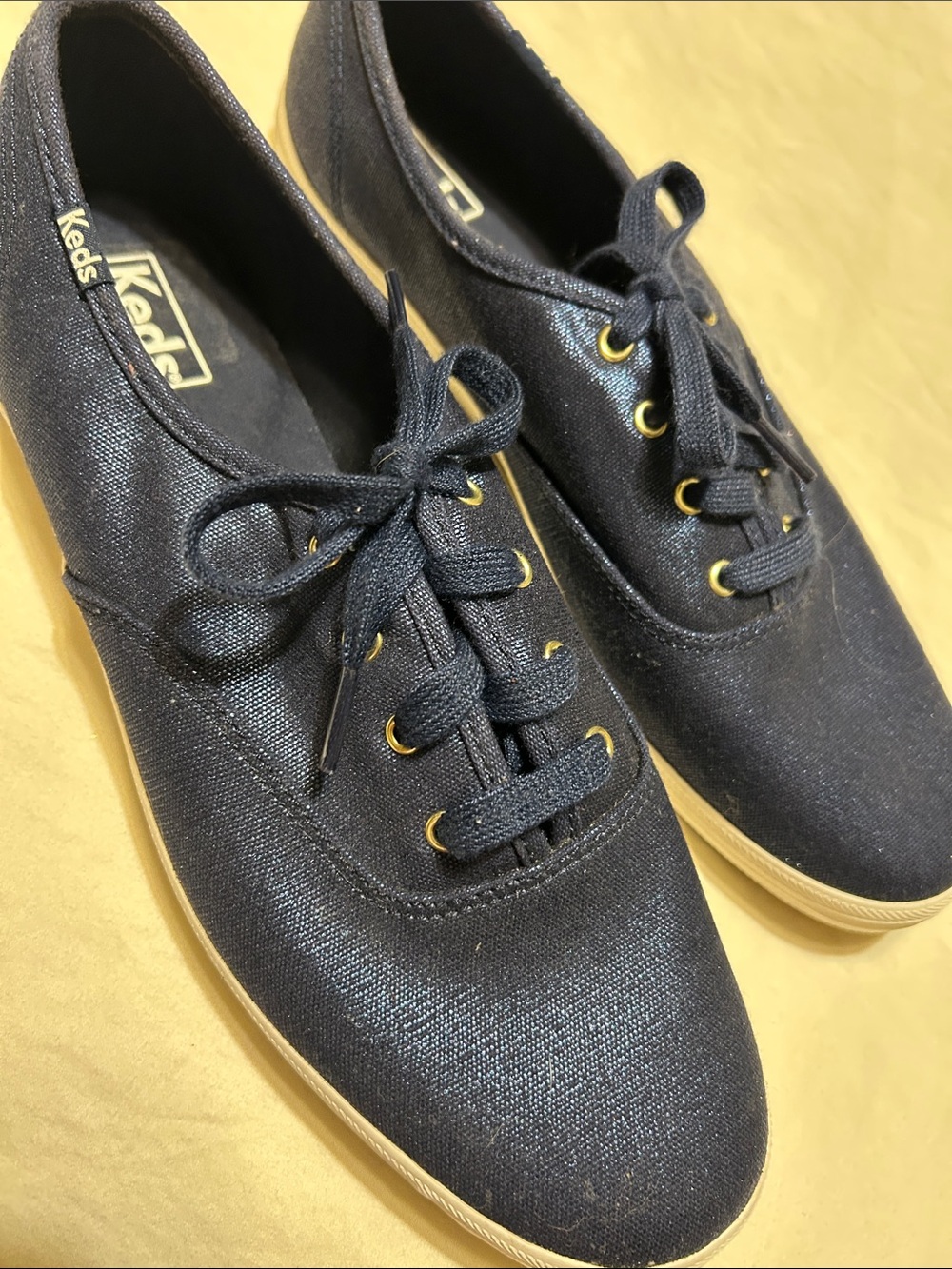 Keds Navy Canvas Low-Top Sneakers with Gold Eyelets
